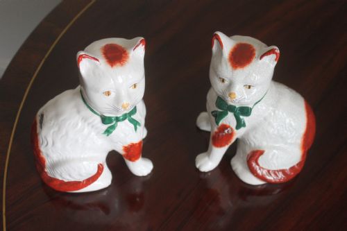 A PAIR OF 19TH CENTURY STAFFORDSHIRE CATS - ADDITIONAL PHOTO 2