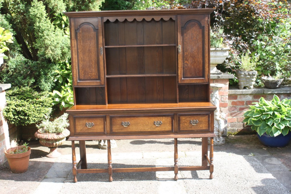 A 19th century oak and mahogany crossbanded dresser