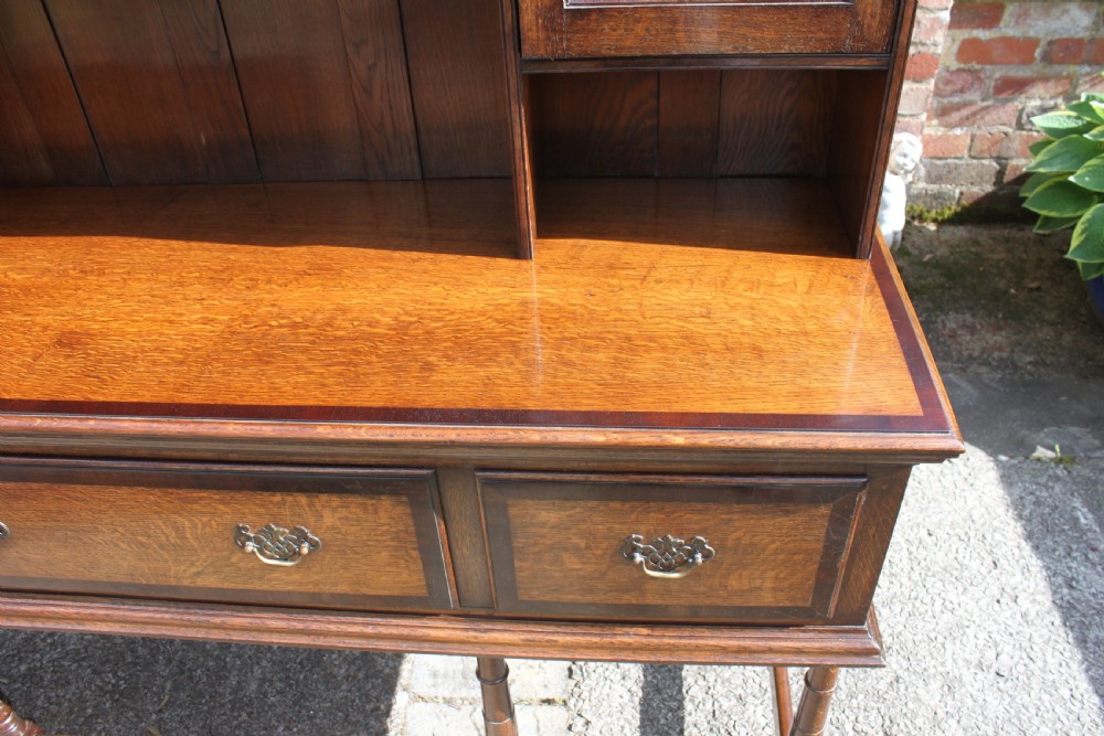 A 19th century oak and mahogany crossbanded dresser View V