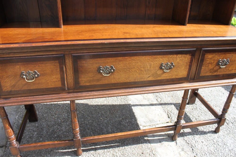 A 19th century oak and mahogany crossbanded dresser View VII