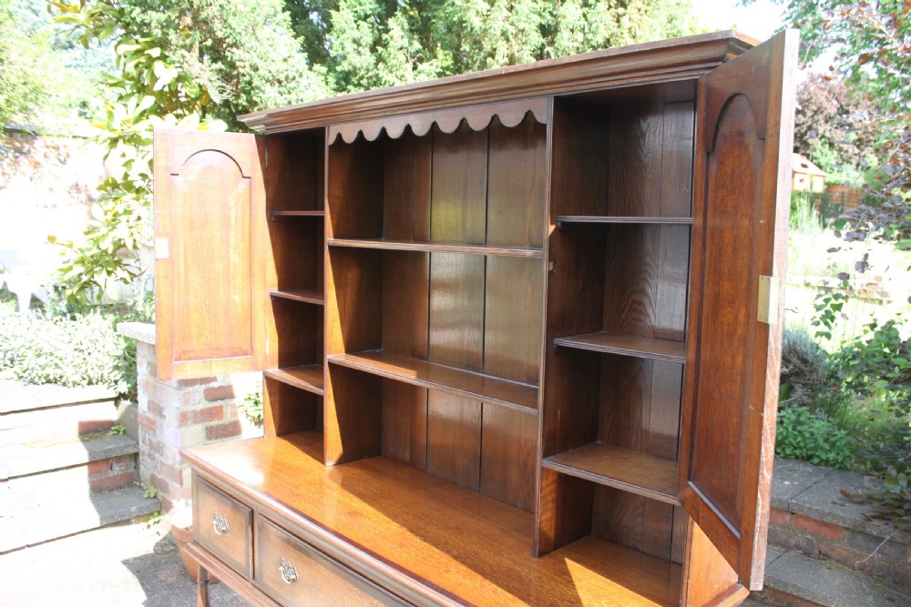 A 19th century oak and mahogany crossbanded dresser View X