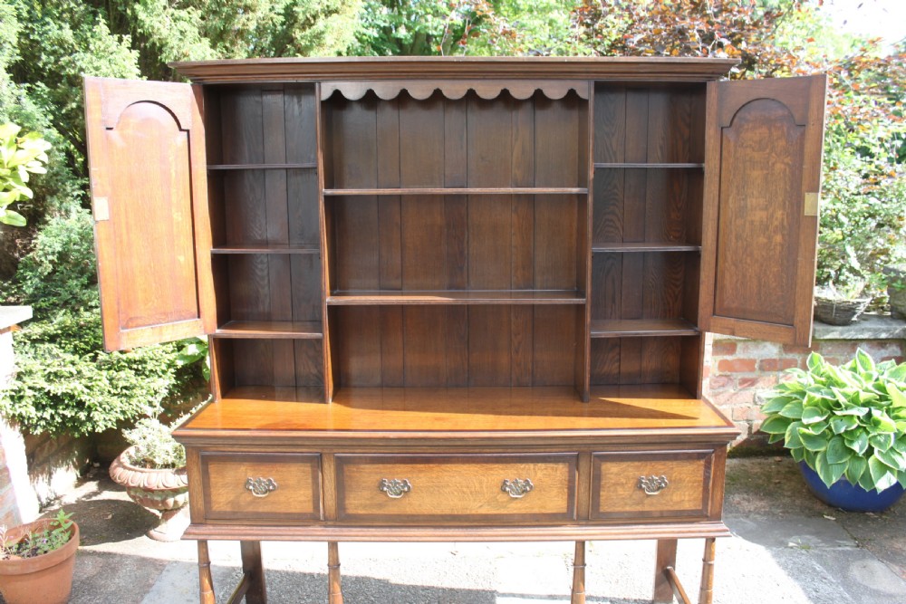 A 19th century oak and mahogany crossbanded dresser View XI