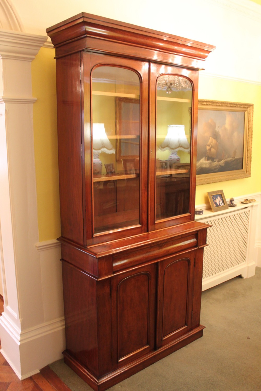 Victorian mahogany two door bookcase on cupboard View II