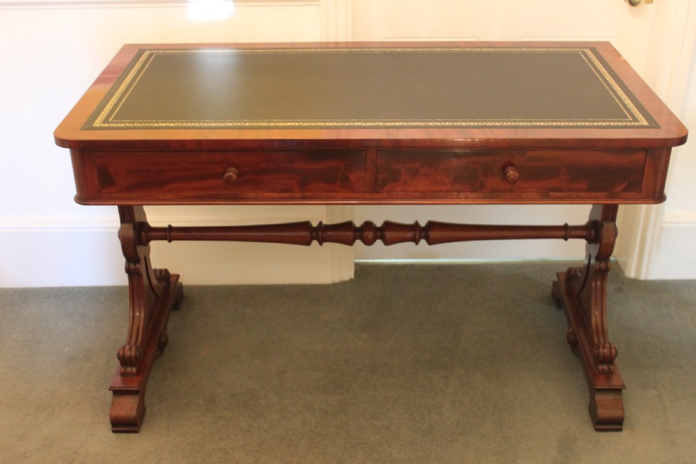 An early 19th century mahogany two drawer desk, writing or library table by Gillows of Lancaster