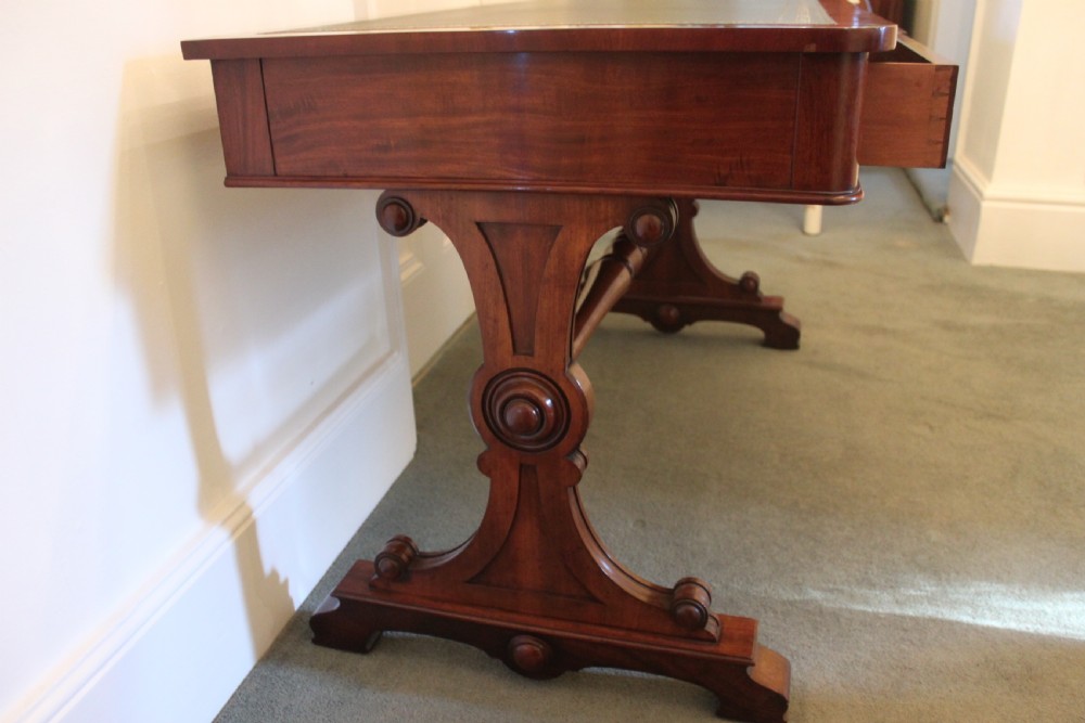 An early 19th century mahogany two drawer desk, writing or library table by Gillows of Lancaster View V
