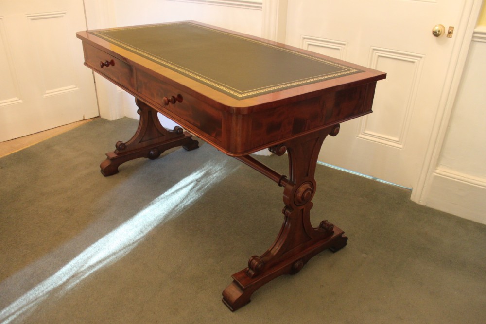 An early 19th century mahogany two drawer desk, writing or library table by Gillows of Lancaster View XII
