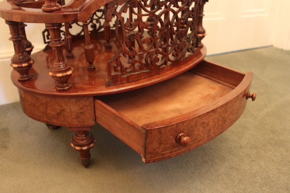 A superb quality early Victorian walnut inlaid Canterbury what-not View VIII
