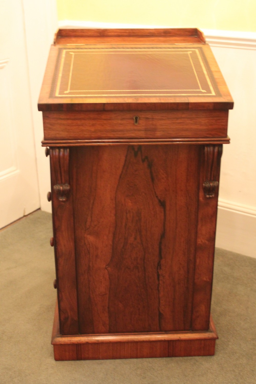 A fine original Regency George IV rosewood davenport  View III