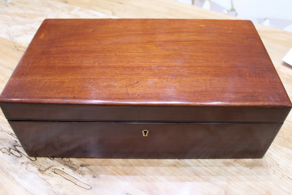 An early Victorian mahogany writing slope.