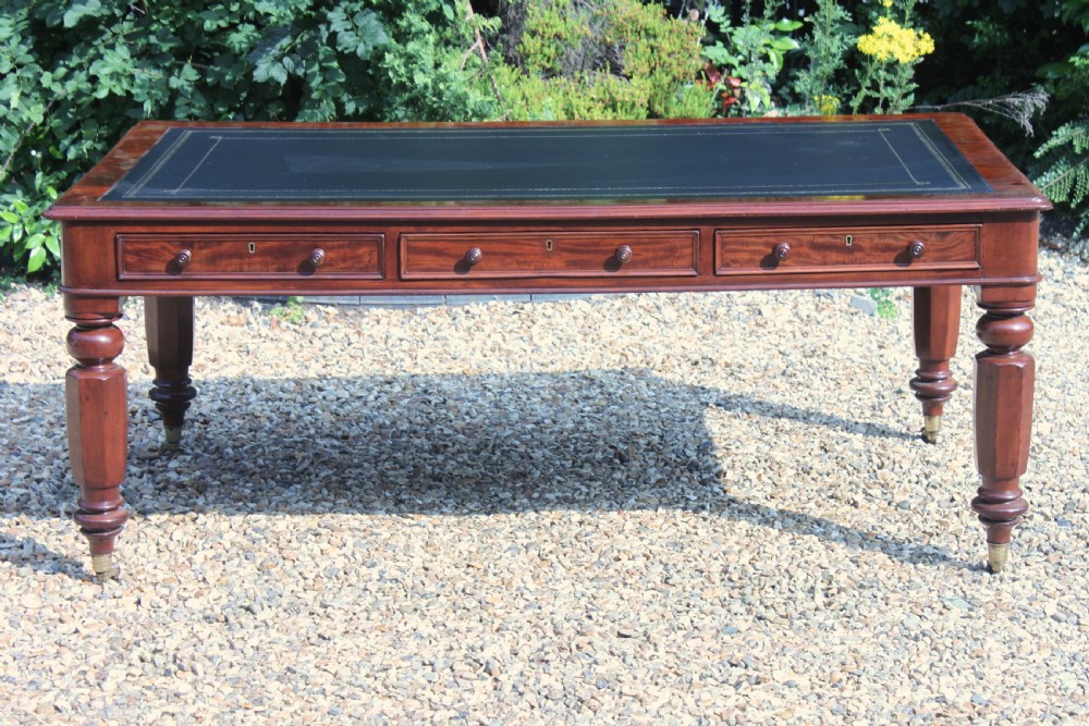 A fine 19th century Victorian mahogany partners library table. View V
