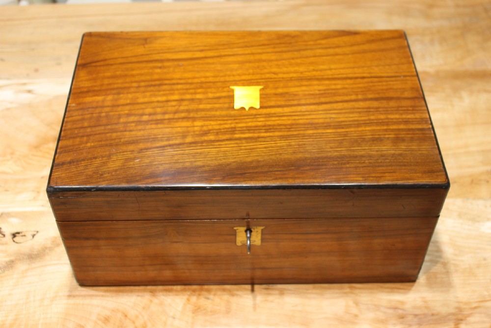 A Victorian walnut writing slope.