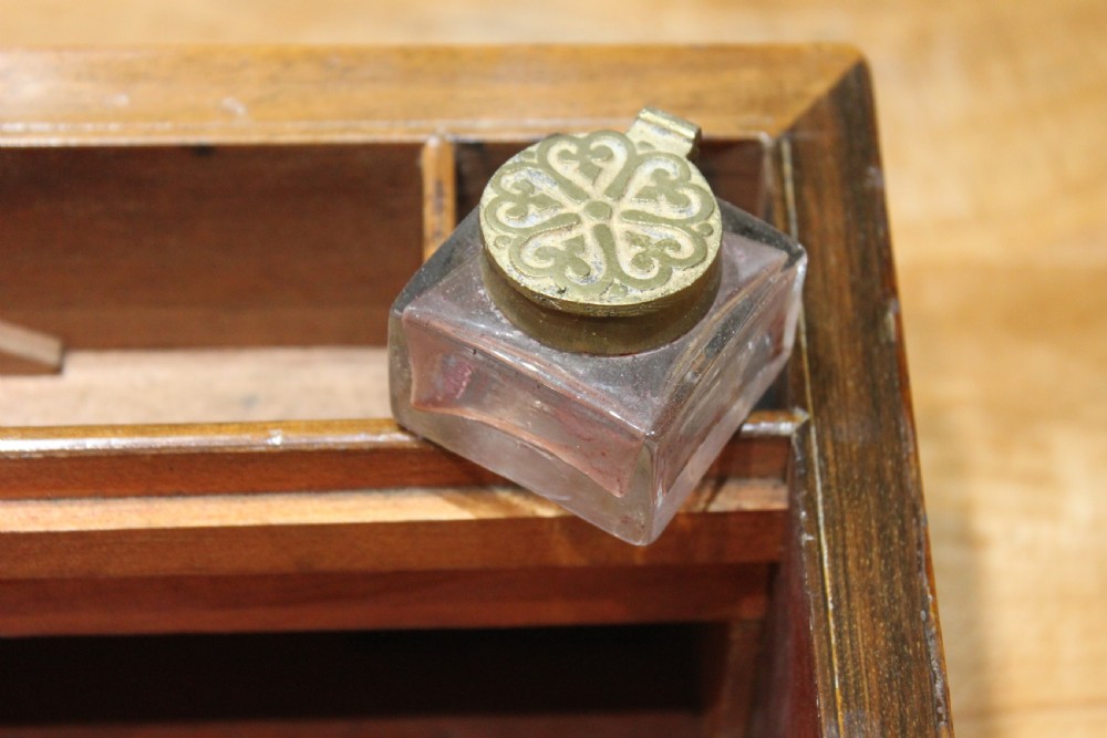 A Victorian walnut writing slope. View IX