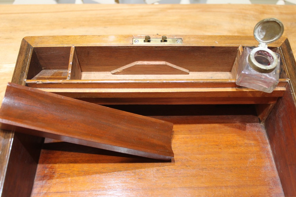 A Victorian walnut writing slope. View XI