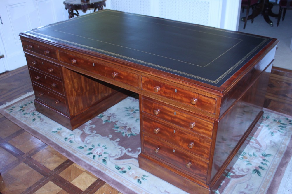 A fine George IV early 19th century 18 drawer mahogany partners desk View X