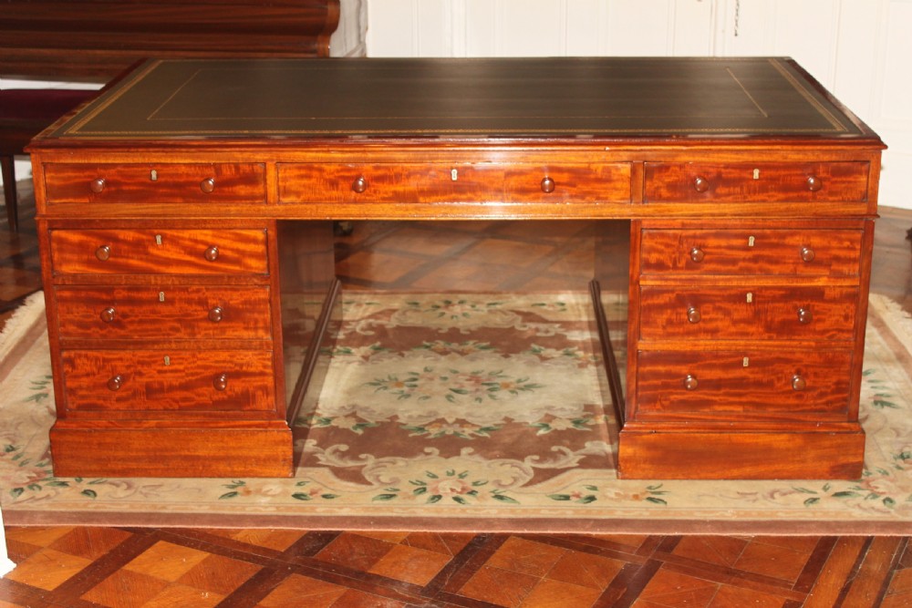 A fine George IV early 19th century 18 drawer mahogany partners desk View XX