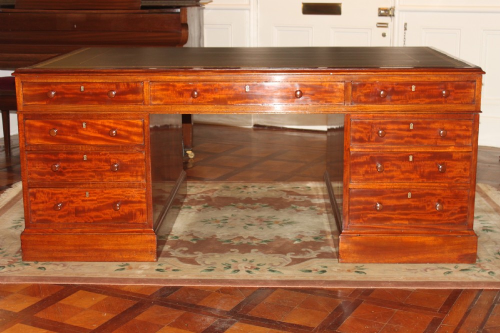 A fine George IV early 19th century 18 drawer mahogany partners desk View XXI