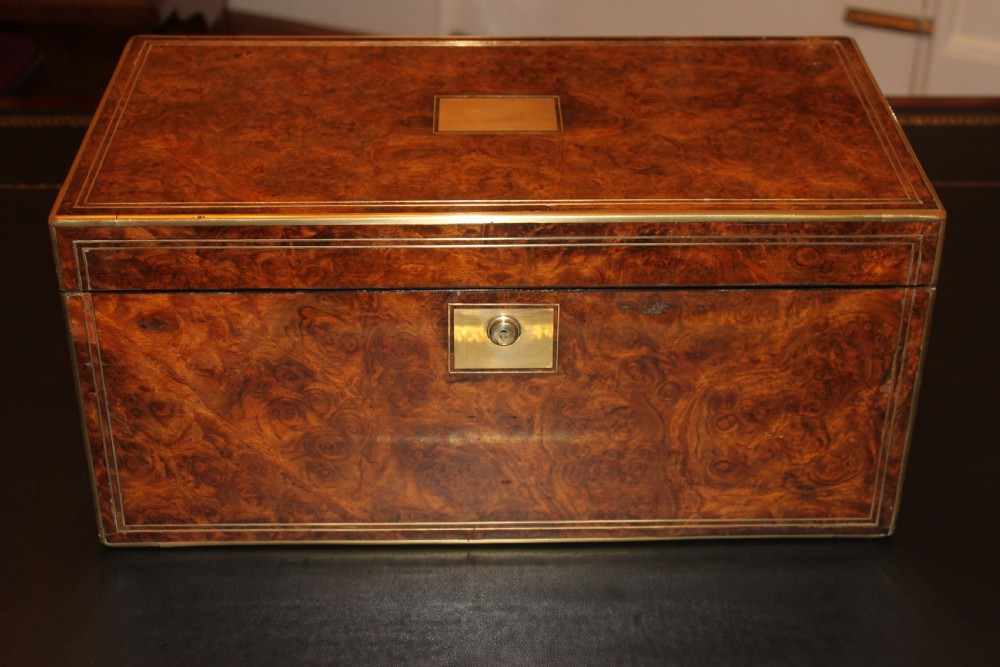 A 19th. century top quality burr walnut and brass inlaid writing slope.