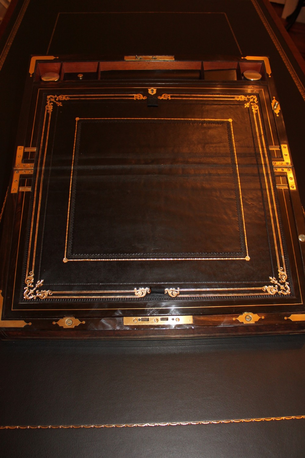 A 19th. century top quality burr walnut and brass inlaid writing slope. View V