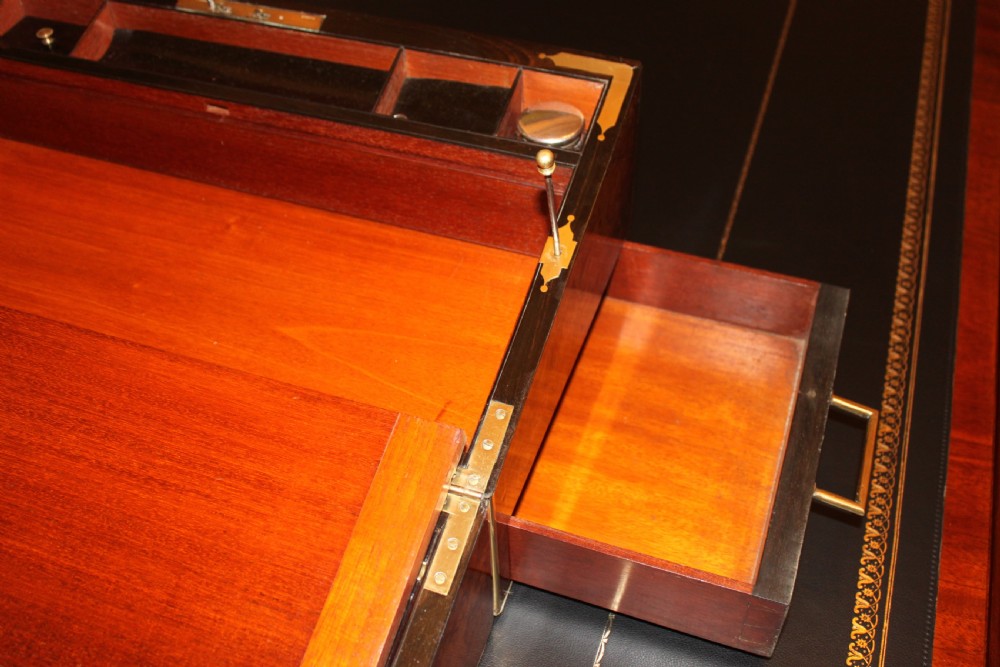 A 19th. century top quality burr walnut and brass inlaid writing slope. View X