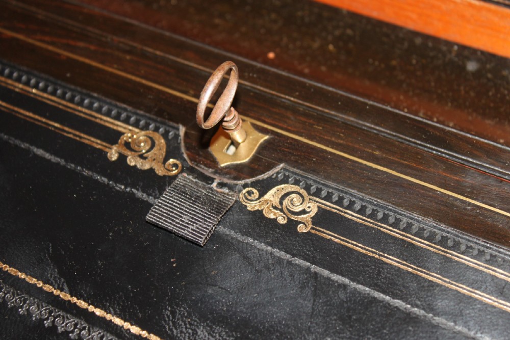 A 19th. century top quality burr walnut and brass inlaid writing slope. View XII