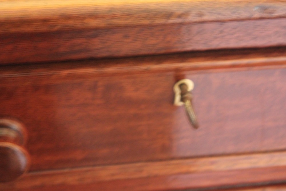 An early 19th century light mahogany six drawer partners library table View XII