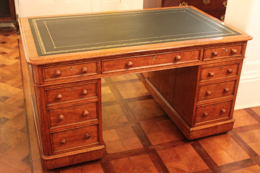 A fine quality oak pedestal desk by Edwards & Roberts View II