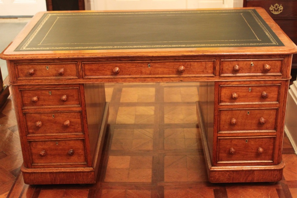 A fine quality oak pedestal desk by Edwards & Roberts View III