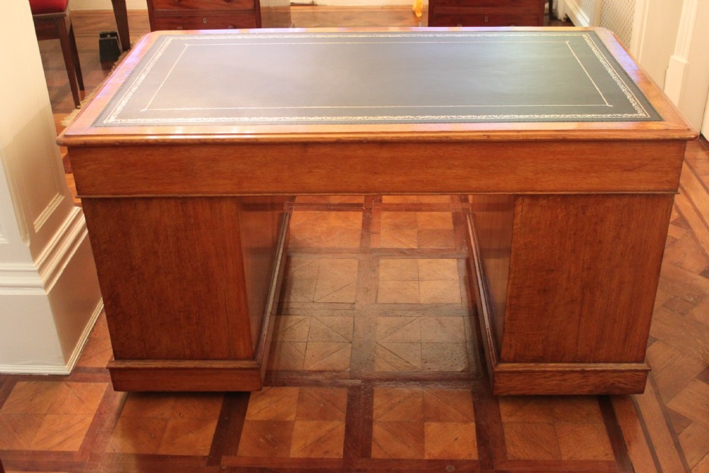 A fine quality oak pedestal desk by Edwards & Roberts View XIV