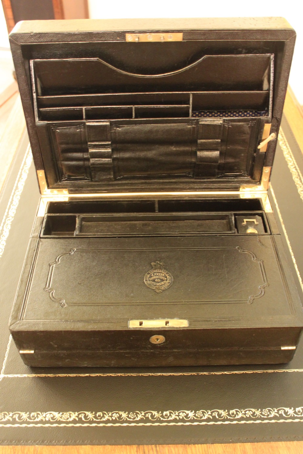 A rare black leather bound writing slope by J Fryer, Charing Cross, London. View XXV