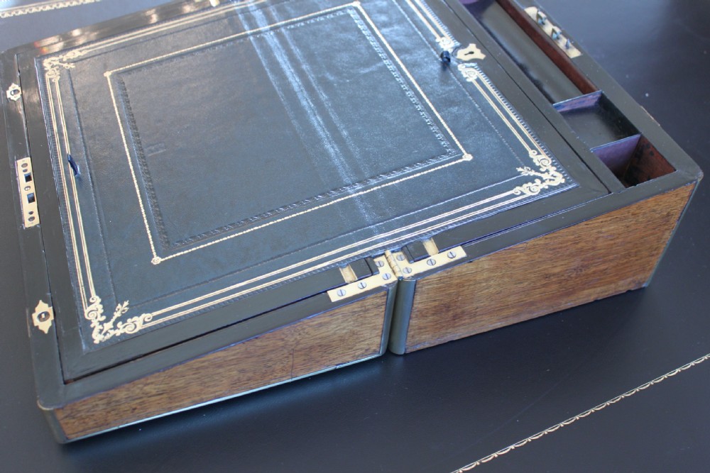 A fine Victorian burr walnut and brass bound writing slope. View VI