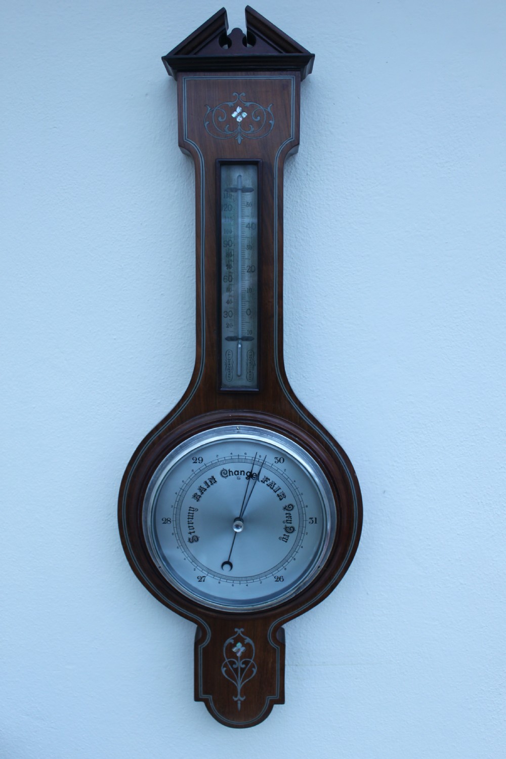 An early 20th century inlaid mahogany aneroid barometer View VIII