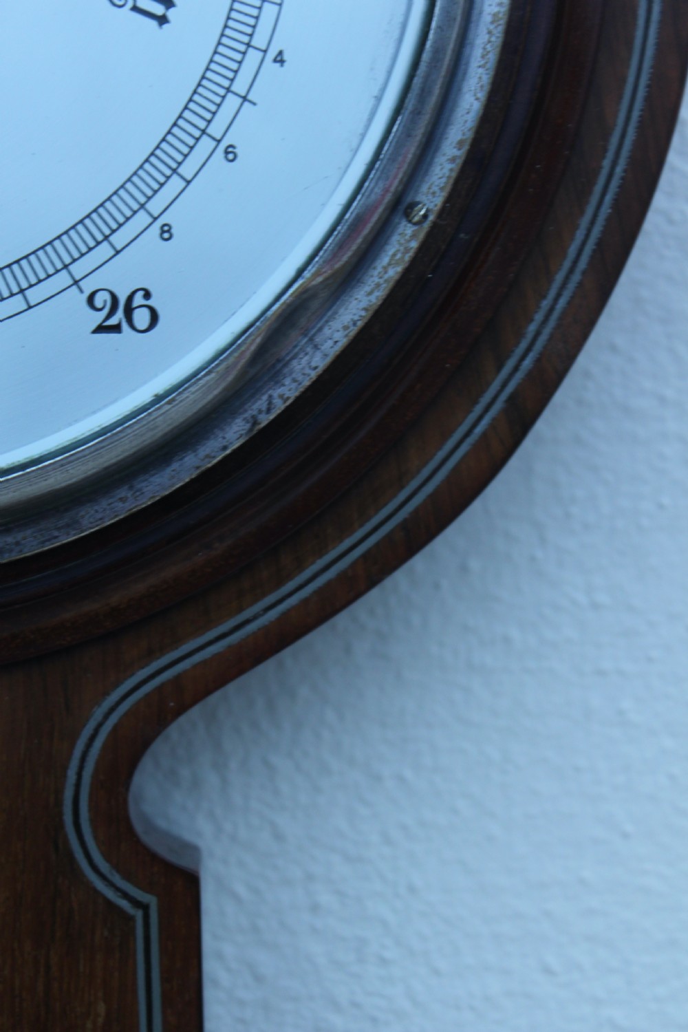 An early 20th century inlaid mahogany aneroid barometer View X