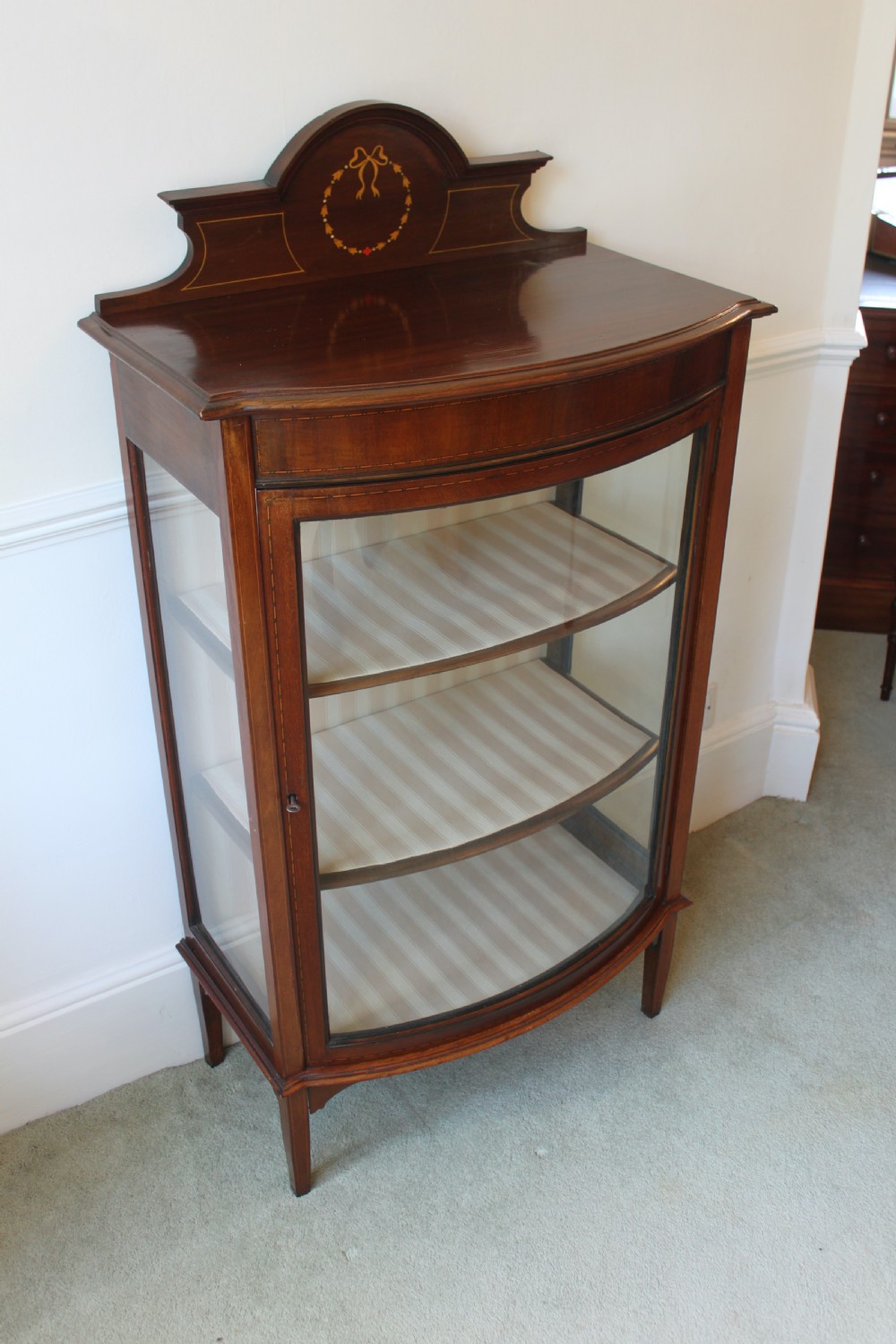 Edwardian mahogany and inlaid bow front display cabinet View IV