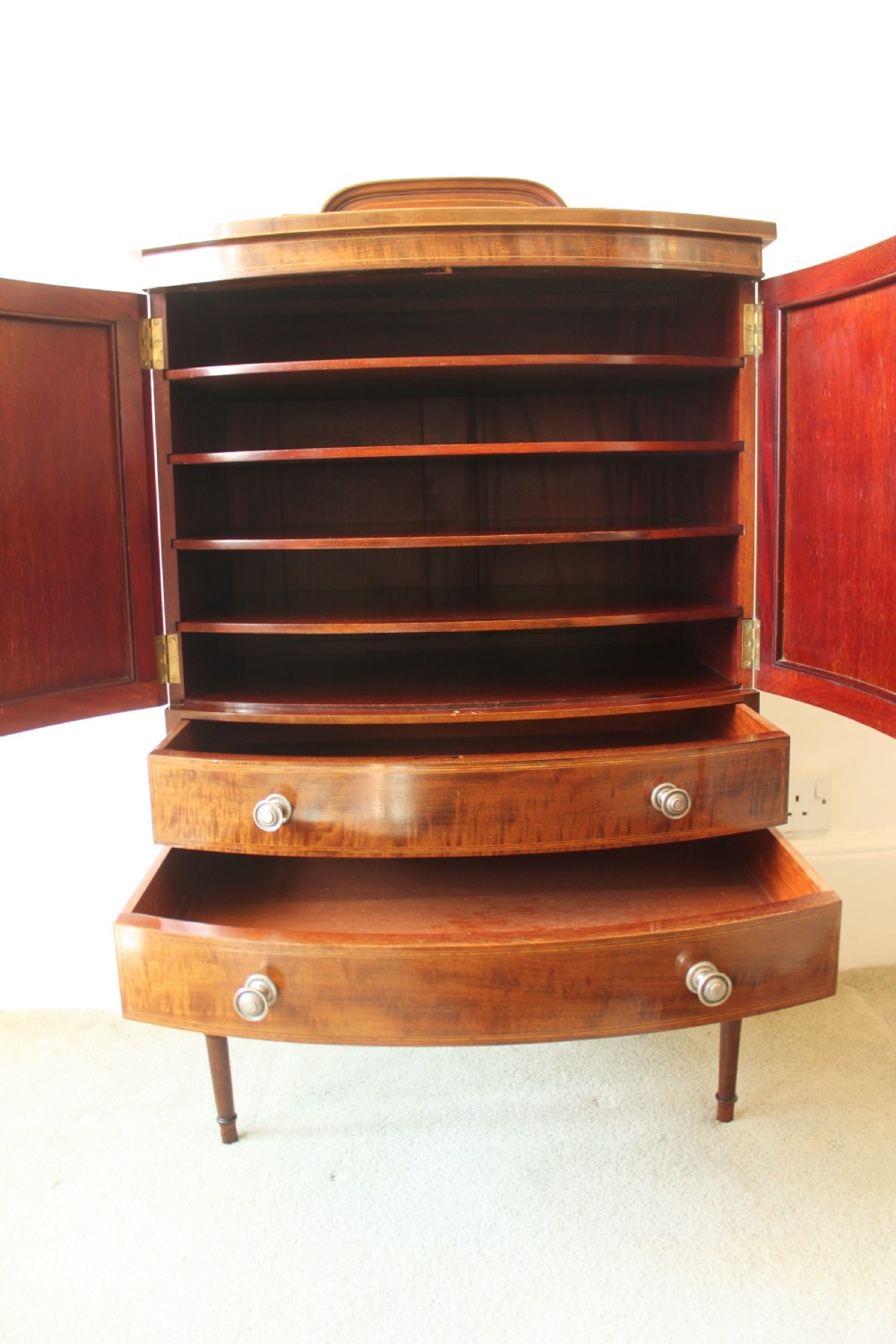 A fine quality Edwardian inlaid bowfront mahogany music cabinet. View VIII