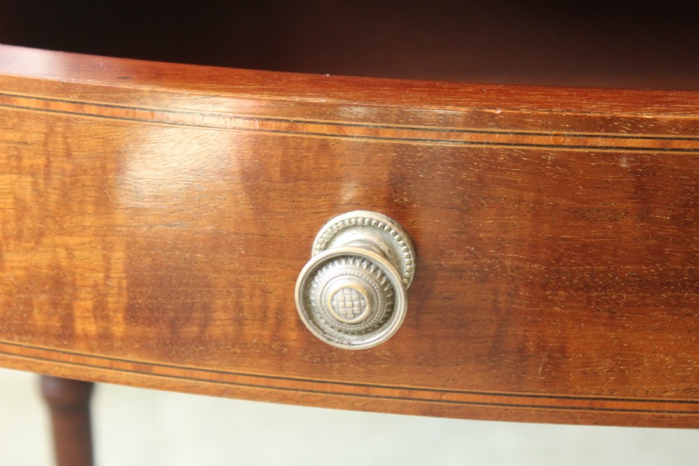 A fine quality Edwardian inlaid bowfront mahogany music cabinet. View IX