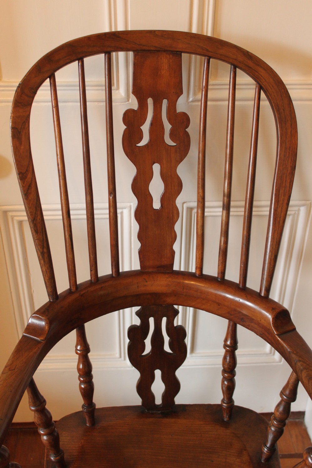 A 19th century north country ash and elm broadarm Windsor armchair. View IV