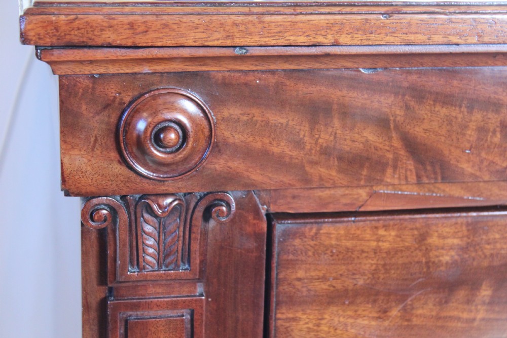 An early 19th century Empire style mahogany chest of drawers View II
