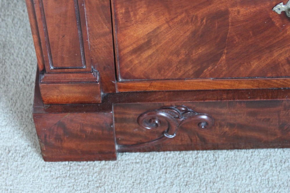 An early 19th century Empire style mahogany chest of drawers View III