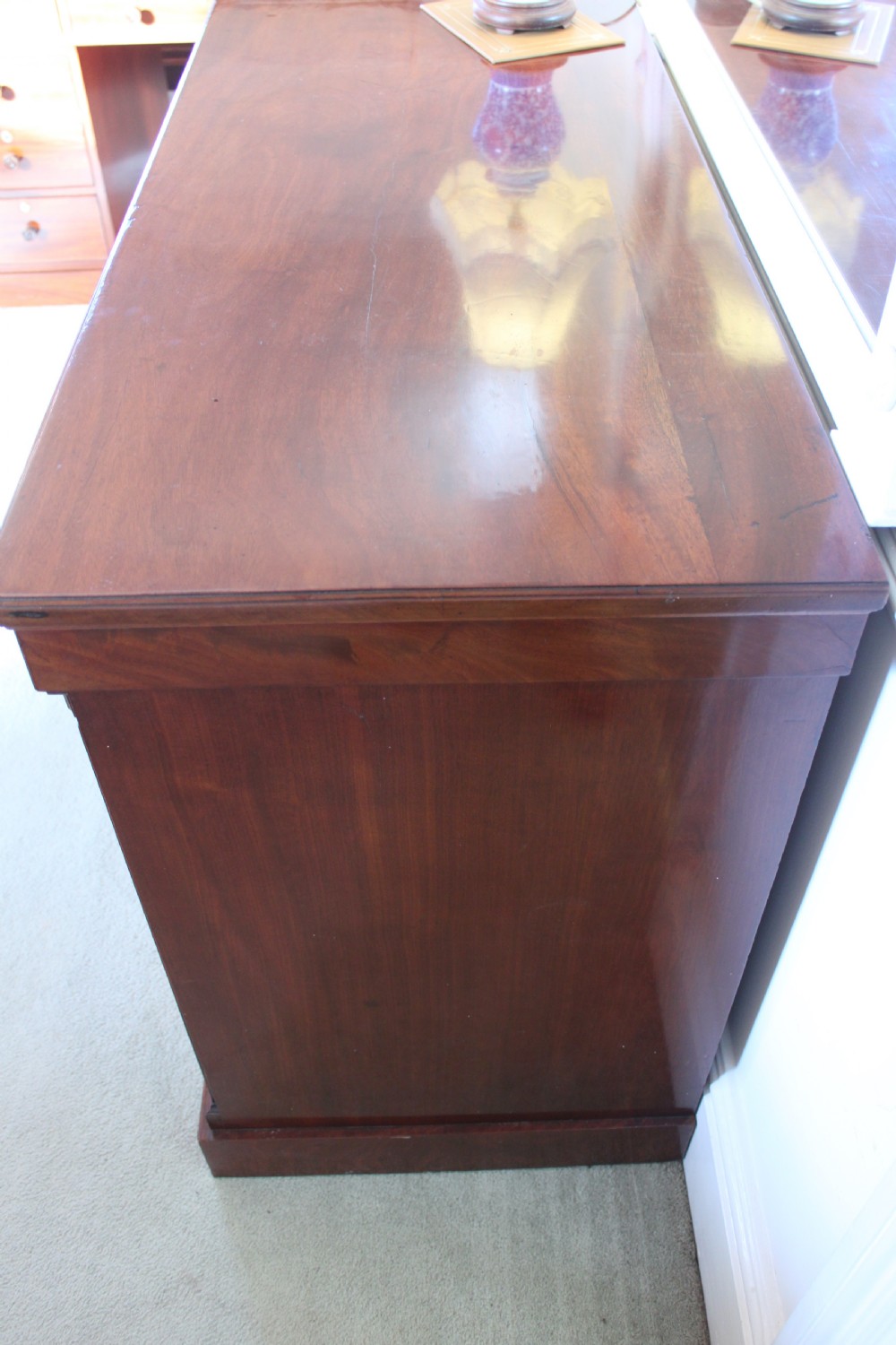 An early 19th century Empire style mahogany chest of drawers View VI