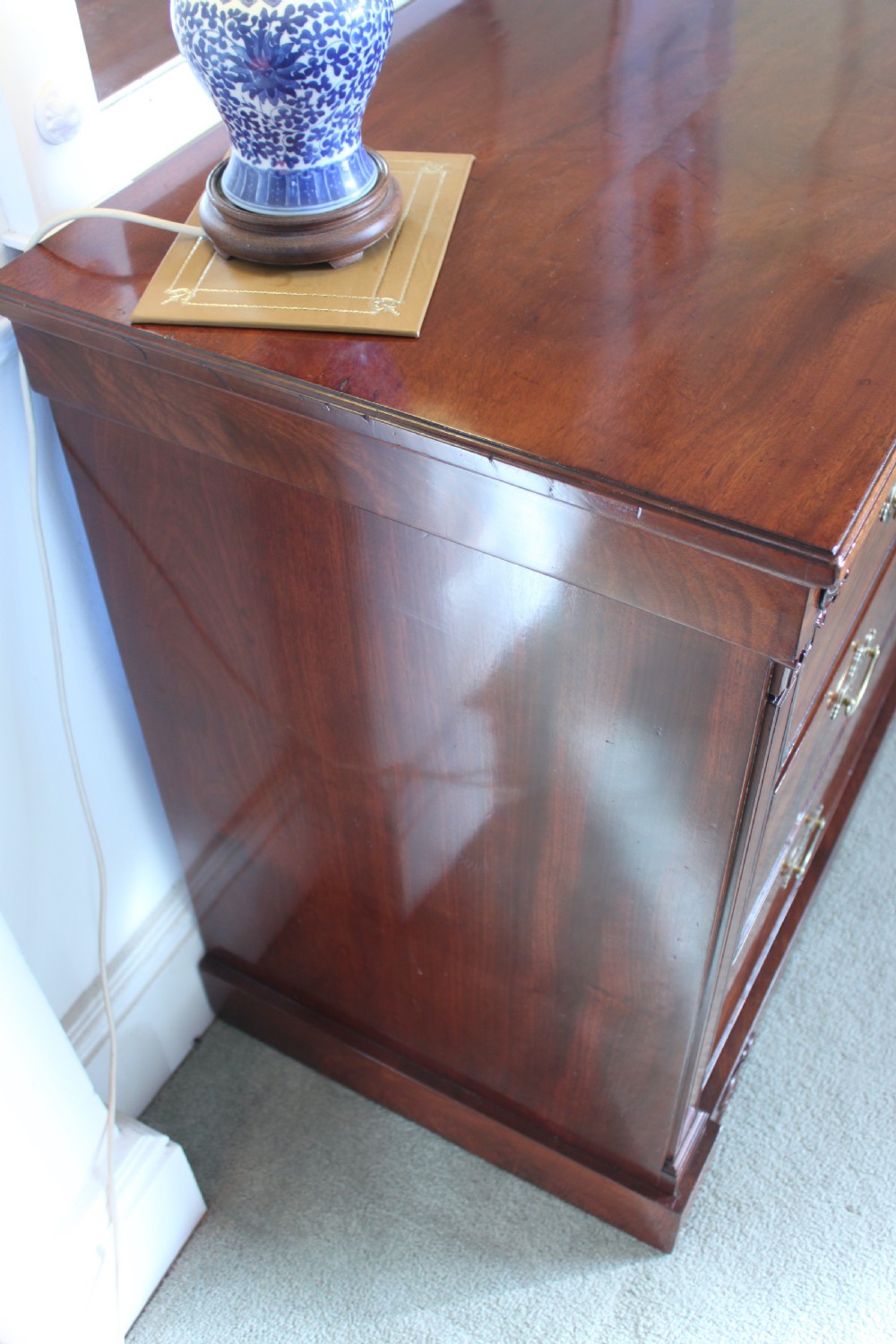 An early 19th century Empire style mahogany chest of drawers View VIII