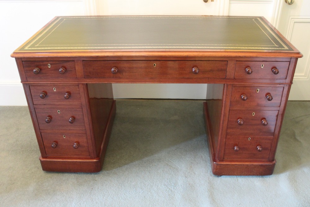 A good quality Victorian mahogany 9-drawer pedestal desk View II