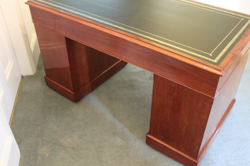A good quality Victorian mahogany 9-drawer pedestal desk View XI