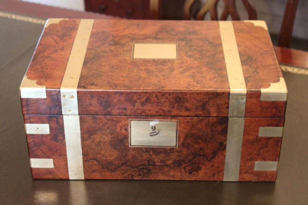A fine Victorian burr walnut and brass bound writing slope.  View II