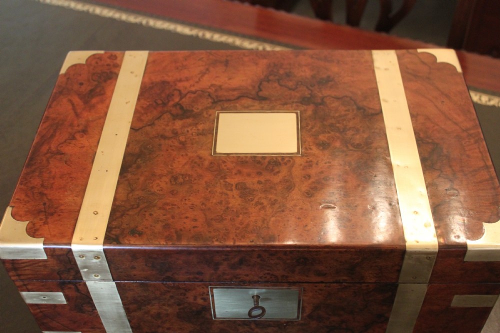 A fine Victorian burr walnut and brass bound writing slope.  View III