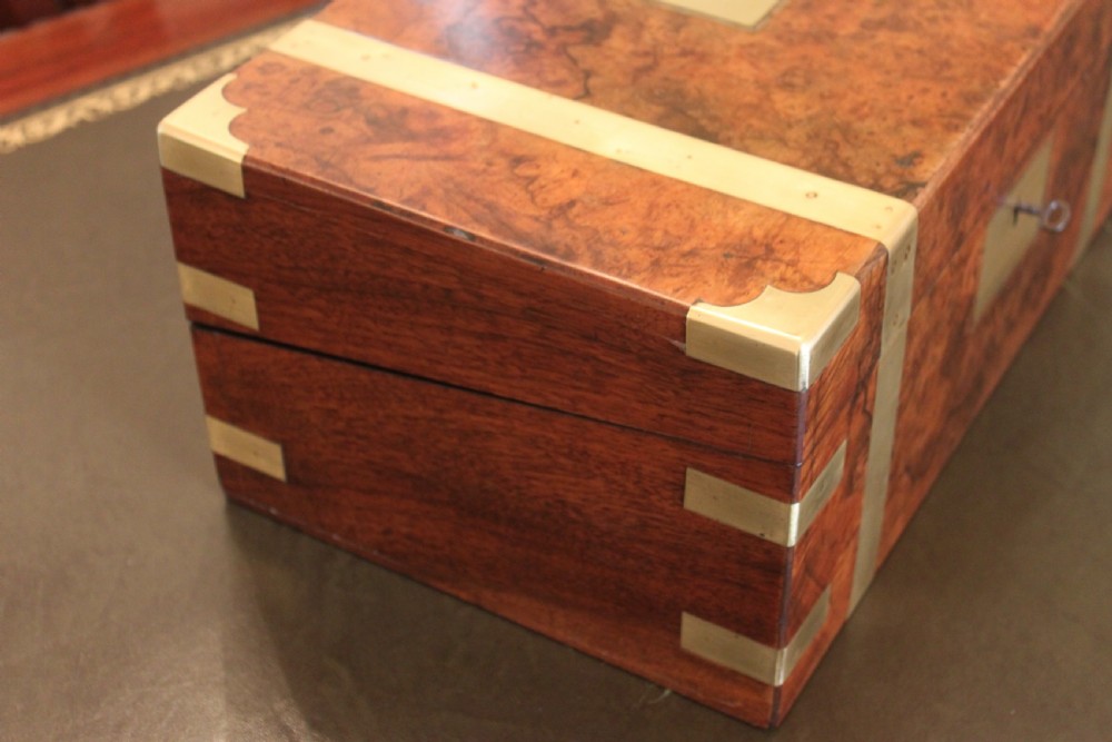 A fine Victorian burr walnut and brass bound writing slope.  View V