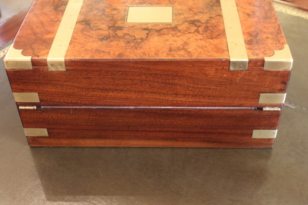A fine Victorian burr walnut and brass bound writing slope.  View VI