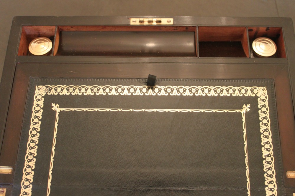 A fine Victorian burr walnut and brass bound writing slope.  View X