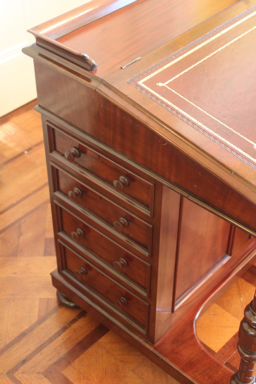 A 19th century mahogany Gentleman's Davenport desk View VI