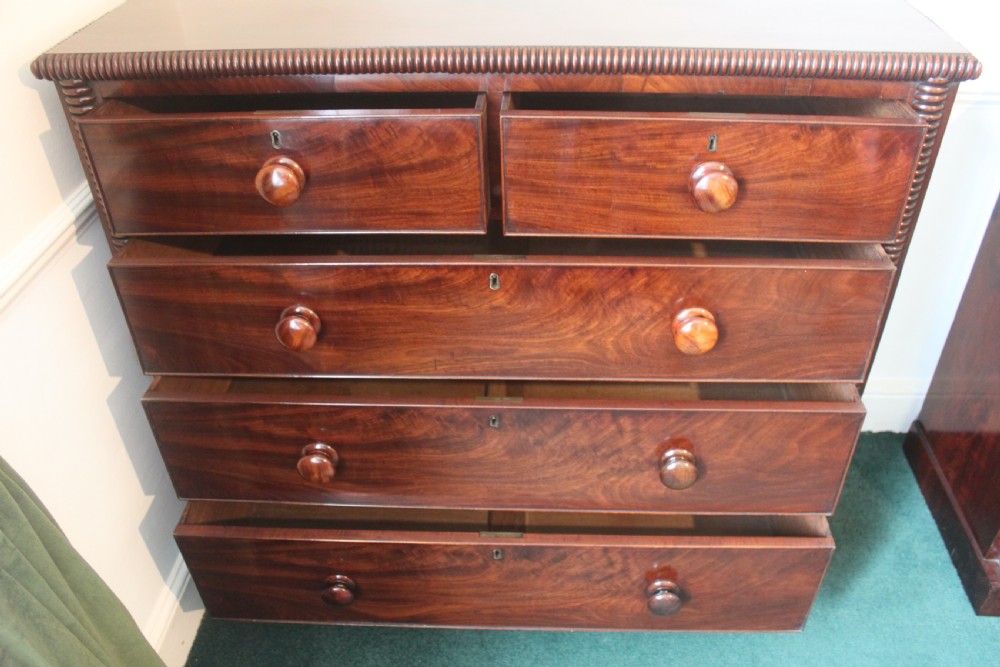 A George IV period mahogany chest of drawers View VII