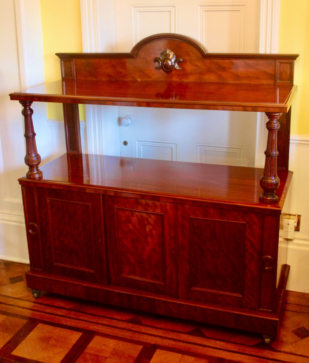 Victorian mahogany buffet sideboard featuring a raised upper tier supported by turned columns above a three-door cupboard base. View II